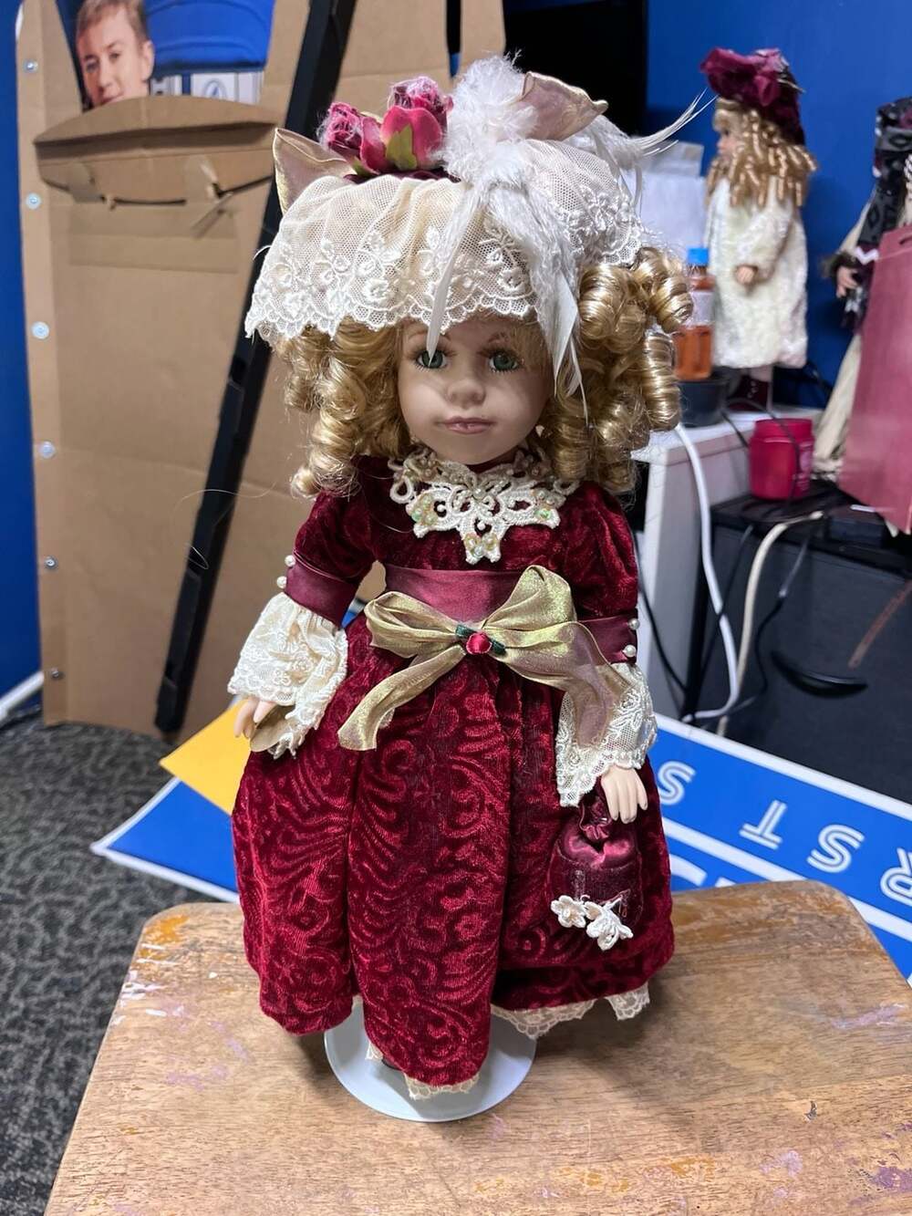 Collector's Choice Bisque Porcelain Doll in Red Velvet Dress with Lace Hat